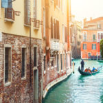 Beautiful canal with old architecture in Venice, Italy.